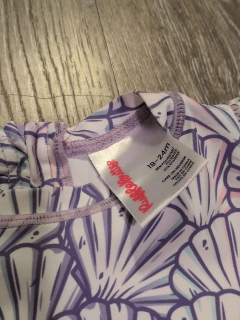 RuffleButts Baby Rashguard Swimsuit 18-24m Seashell Pattern